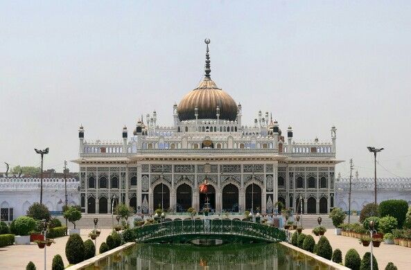 This is the Chota Imambada, the tourist place in Lucknow, India.
Also known as the Imambara Hussainabad, this beautiful monument was built by Muhammad Ali Shah, the third Nawab of Awadh, in 1838. It serves as a congregational hall for Shia Muslims and also houses the tombs of Muhammad Ali Shah and his mother. The intricate Indo-Islamic architecture, with its ornate designs and a golden dome, makes it a stunning landmark.
