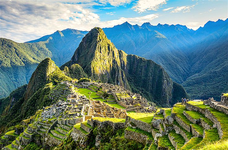 “Machu Picchu ancient Inca citadel in Peru surrounded by the Andes mountains”