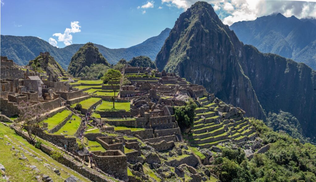 “Machu Picchu stone ruins and terraces with scenic Andes mountain backdrop in Peru”“Machu Picchu stone ruins and terraces with scenic Andes mountain backdrop in Peru”